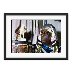 Sun Ra with a Horus sculpture inside his home in Germantown, PA, 1980 — photograph by Veryl Oakland