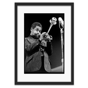 Dizzy Gillespie glancing at camera while performing at Monterey Jazz Festival, 1975 — photograph by Veryl Oakland