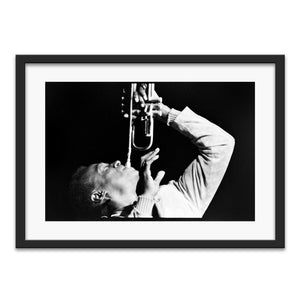 Miles Davis with his trumpet up at UC Berkeley Jazz Festival, 1970 — photograph by Veryl Oakland