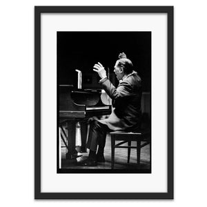 Duke Ellington with his hands up from the piano, Berkeley, CA, 1976 — photograph by Veryl Oakland