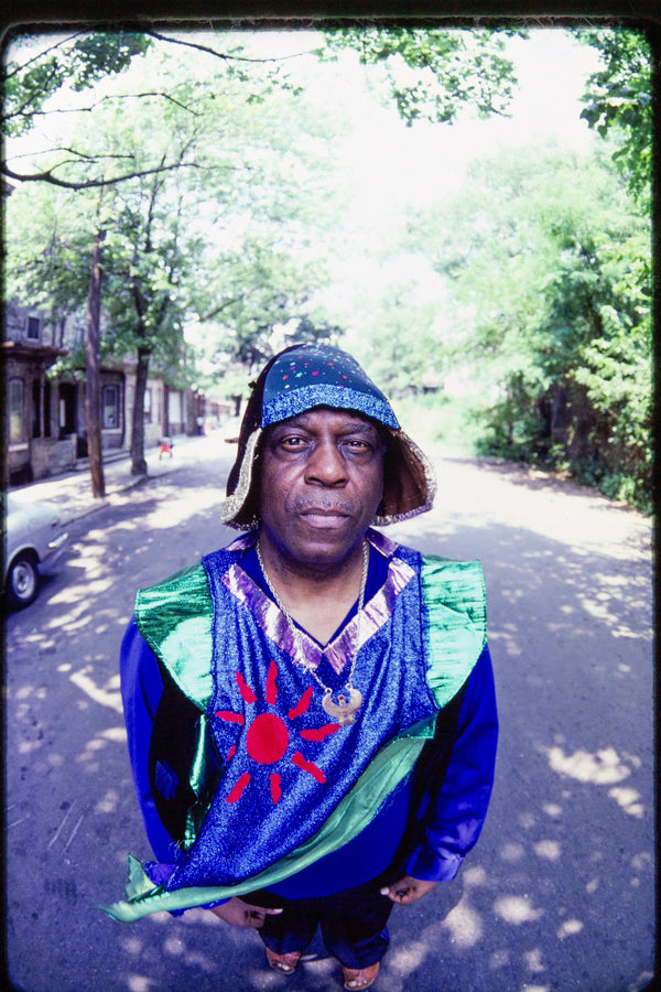 Sun Ra under the trees in Germantown, PA, 1980 — photograph by Veryl Oakland