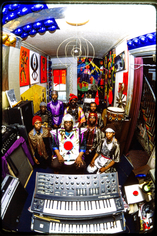 Sun Ra Arkestra inside their home in Germantown, PA, 1980 — photograph by Veryl Oakland